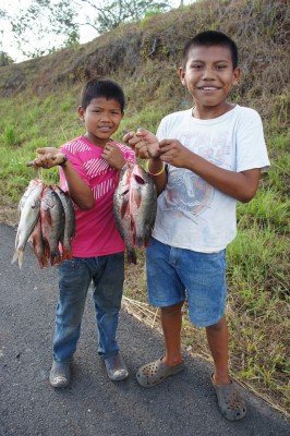 Kids selling fish along the Panamerican Highway