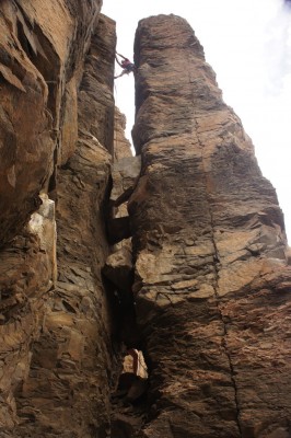 Myself, climbing up some sort of a split pillar